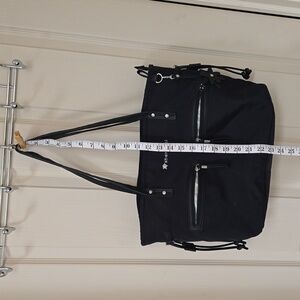 Sherpani black "Bria" tote/personal size travel bag. Excellent condition! L@@K!!